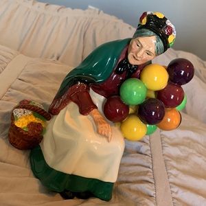 Vintage Royal Doultan balloon seller.